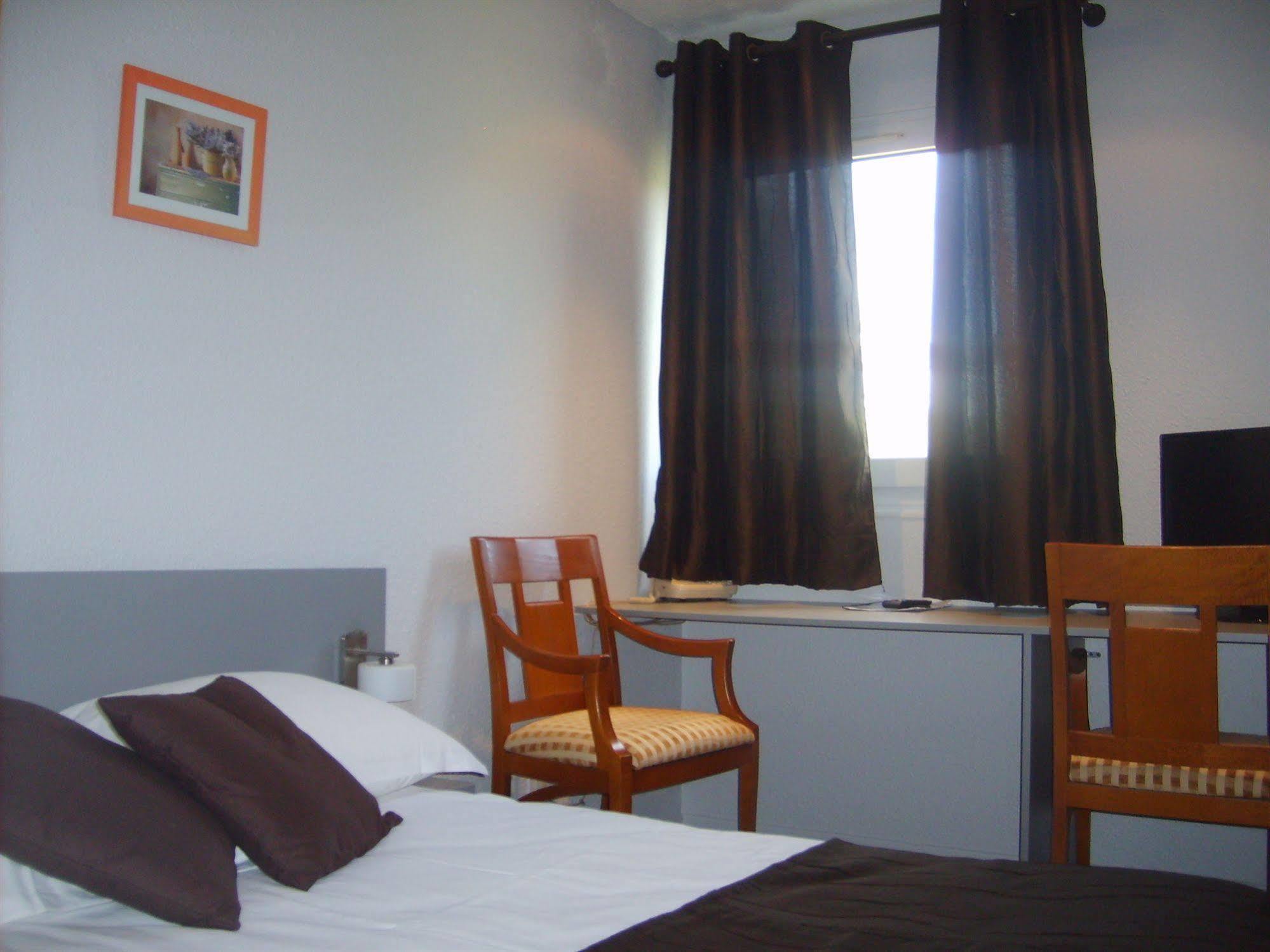 Les Orchidees , Hotel & Restaurant Verdun-sur-Meuse ภายนอก รูปภาพ